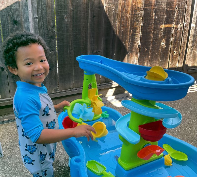 Harlan Playing at the Water Table