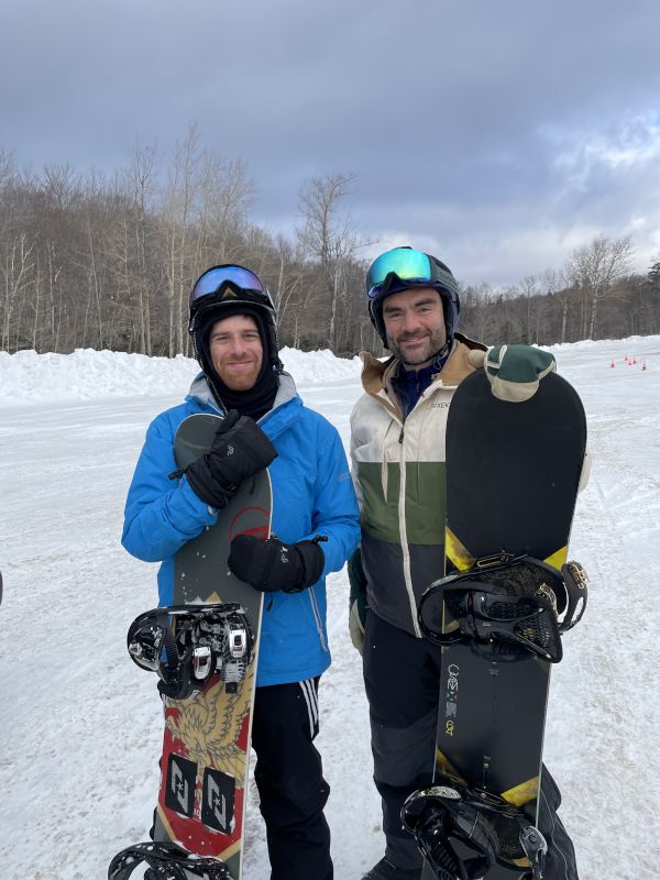 James Snowboarding With a Friend